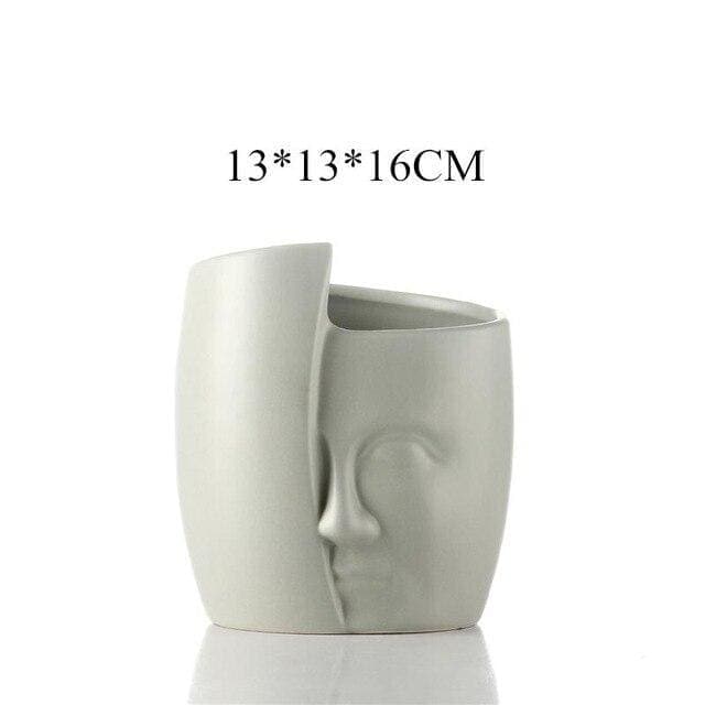 Hvid Stående Plantekasse Med Skjult Ansigt