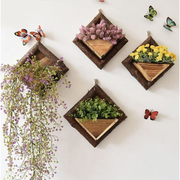 Blomsterkrukke I Træ På Væg